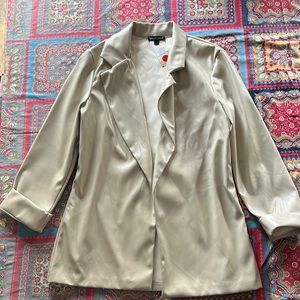 leather tan blazer, the brand is wearever the color is tan, size is large.